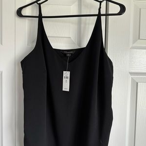 Black tank top/camisole. 100% polyester.